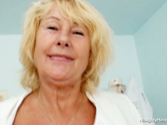 Emotional blond old nurse Greta polishes her quim with a sex toy ardently